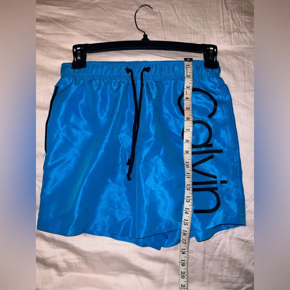 Calvin Klein Men’s Light Blue Lined Swim Trunks Size S